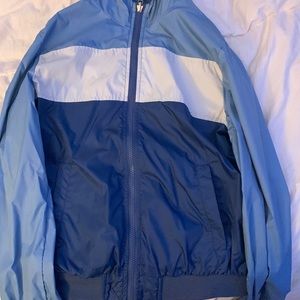 Benetton irreversible zip up wind breaker.